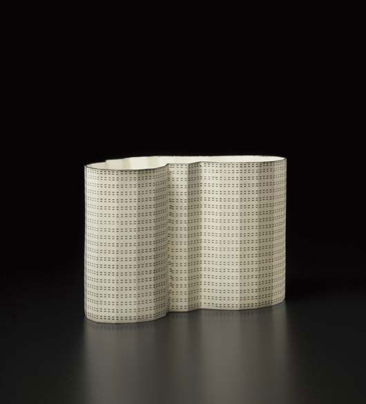 BODIL MANZ, "Angular form decorated with grey inter: Angular form decorated with grey interrupted lines", 2001 Cast porcelain, transfer-printed glaze. 5 3/4 in. (14.6 cm.) high Underside painted with "BODIL MANZ" and with artist's monogram. PROVENANCE G