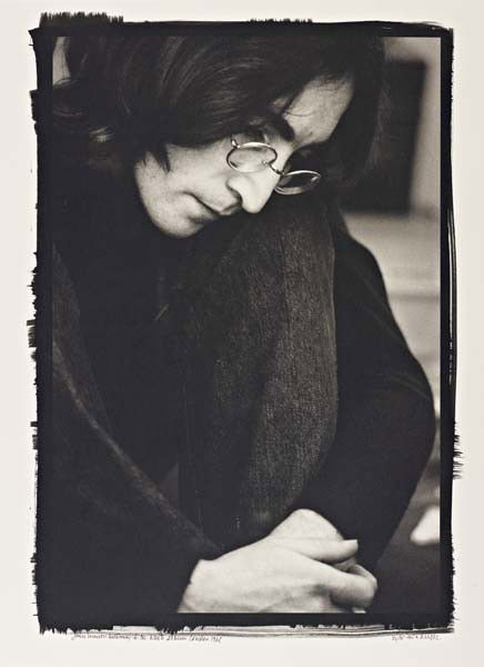 ETHAN RUSSELL, John Lennon Listening to the 'White: John Lennon Listening to the 'White Album', London, 1968 Platinum palladium print, printed later. 46 x 38.4 cm (18 1/8 x 15 1/8 in). Signed, titled, dated and numbered 21/35 in ink in the margin. R