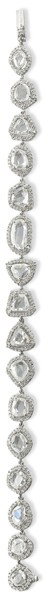 A diamond line bracelet: A diamond line bracelet Designed as a continuous line of modified rose-cut diamonds set within micro-pavé clusters, estimated diamond weight 6.50 carats, length 19 cm. †