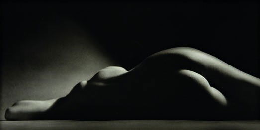 RUTH BERNHARD, Sand Dune, 1967: Sand Dune, 1967 Gelatin silver print, printed later. 6 7/8 x 13 5/8 in. (17.5 x 34.6 cm). Signed in pencil on the mount; signed, titled, dated in pencil and copyright credit stamp on the reverse of th