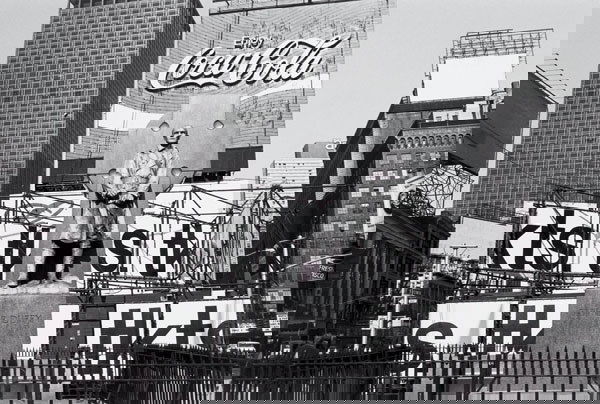 LEE FRIEDLANDER American, b. 1934 Father Duff: LEEFRIEDLANDERAmerican, b. 1934Father Duffy, Times Square, NYC, 1974.Gelatin silver print.7¨ö x 11