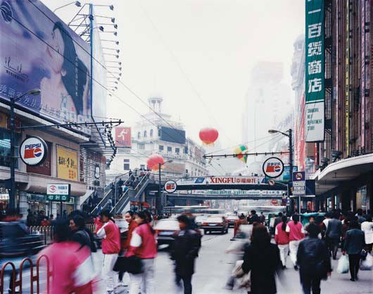 THOMAS STRUTH, Nanjing Xi Lu, Shanghai, 1997: Nanjing Xi Lu, Shanghai, 1997. Digital colour coupler print, face-mounted on Plexiglas in artist’s frame. 189 × 225 cm (74 3/8 × 88 5/8 in). Signed ‘T. Struth’ on a label attached to the r