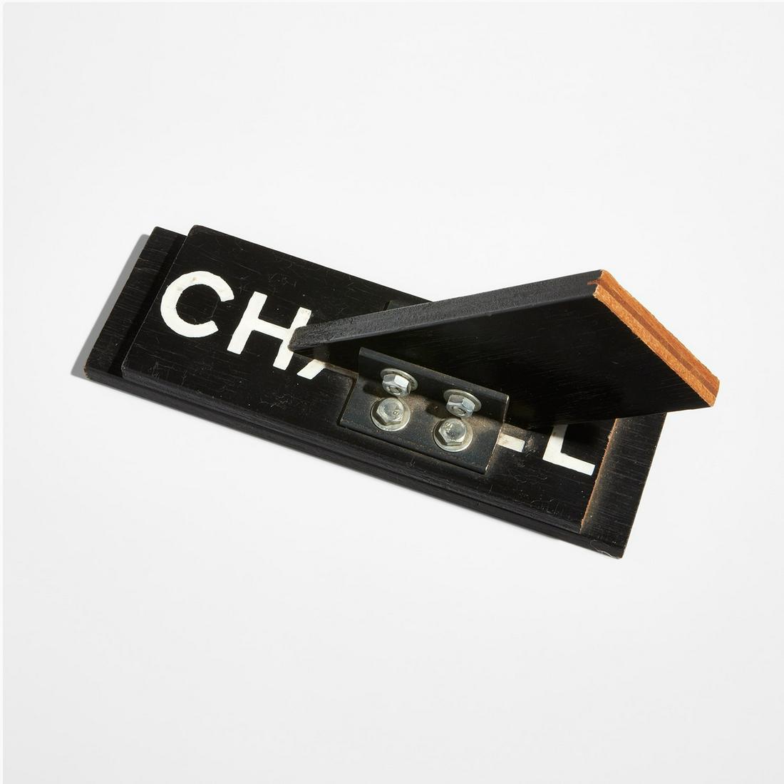 Tom Sachs: Chanel Rat Trap (maquette) 1999/2012 Painted wood multiple with metal bolts. 6 x 9 1/2 x 3 in. (15.2 x 24.1 x 7.6 cm) Signed, dated and dedicated 'For Rosa Esman Love, Tom Sachs' in white marker on th