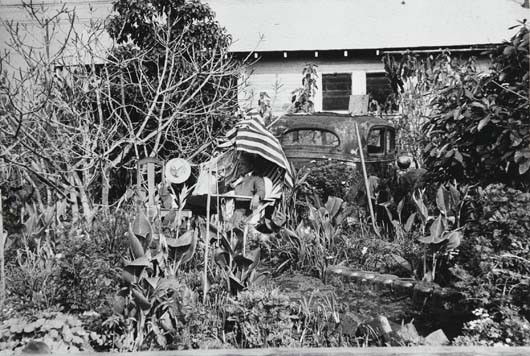 ROBERT FRANK, Backyard, Venice West, California, 19: Backyard, Venice West, California, 1955-1956. Gelatin silver print, printed 1977. 8 x 11 7/8 in. (20.3 x 30.2 cm) Signed and dated in ink in the margin; titled, annotated 'Americans 39/206' in an unid