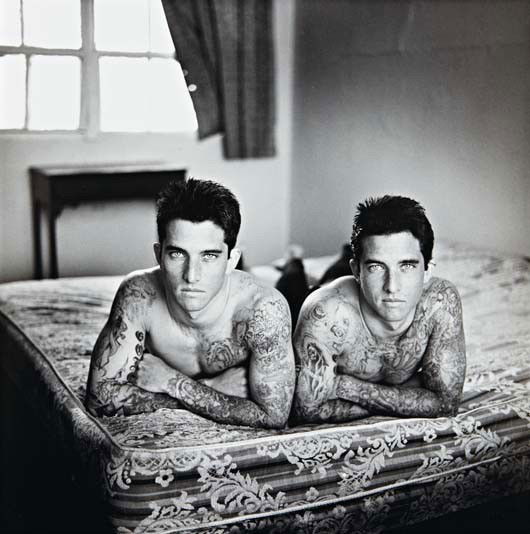 KEN PROBST, Tattooed Twins, San Diego, 1989: Tattooed Twins, San Diego, 1989. Gelatin silver print. 18 x 18 in. (45.7 x 45.7 cm) Signed, titled, dated and numbered 12/20 in pencil on the verso. PROVENANCE Howard Yezerski Gallery, Boston