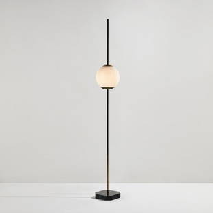 Luigi Caccia Dominioni: Floor lamp, model no. Lte 10 circa 1954 Granite, brass, glass. 87 in. (221 cm) high Manufactured by Azucena, Milan, Italy. Provenance Casati Gallery, Chicago Acquired from the above by the present own