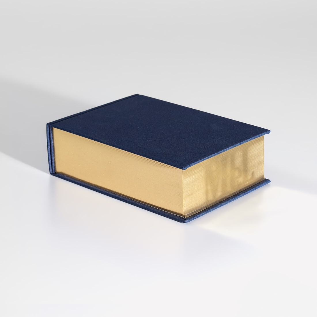 Ed Ruscha: ME and THE 2002 Sculptural book with double fore-edge printing and gold gilt edges. 5 1/4 x 7 1/4 x 2 1/8 in. (13.3 x 18.4 x 5.4 cm) Signed, dated and numbered 77/230 in pencil on the back endsheet (t