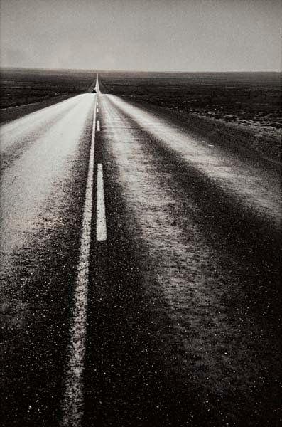 ROBERT FRANK, US 285, New Mexico, 1956: Gelatin silver print, printed 1970s. 13 1/4 x 8 3/4 in. (33.7 x 22.2 cm). Signed, titled and dated in ink in the margin. PROVENANCE G. Ray Hawkins Gallery, Los Angeles