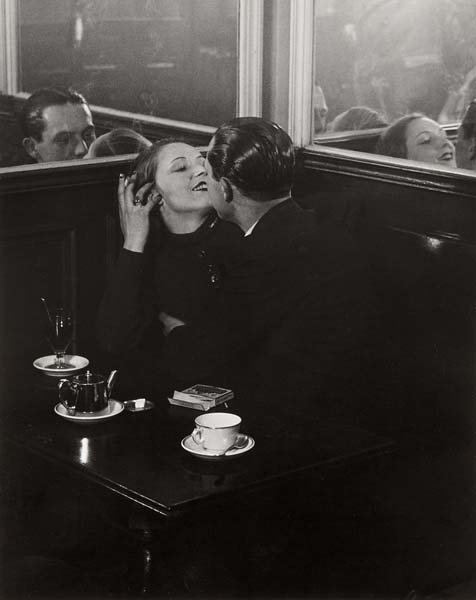 BRASSAÏ (GYULA HALASZ), Couple d'amoureux, quartier: Gelatin silver print, printed later. 10 3/4 x 8 1/2 in. (27.3 x 21.6 cm). Signed in ink in the margin; signed, annotated 'pp. 78', 'Page 71' in pencil and '81, Faubourg St-Jacques' copyright credit st