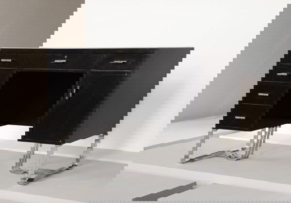 WOLFGANG HOFFMANN Desk, 1930s Manufactured: WOLFGANGHOFFMANNDesk, 1930sManufactured by Howell Company, USA; lacquered wood, chrome-plated banded steel