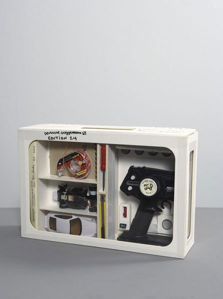 TOM SACHS b. 1966 Untitled, 2003 Kit includi: TOMSACHSb. 1966Untitled, 2003Kit including controler, scotch tape, notebook, lug/wheel wrench, bohle clip, paper clip, plast
