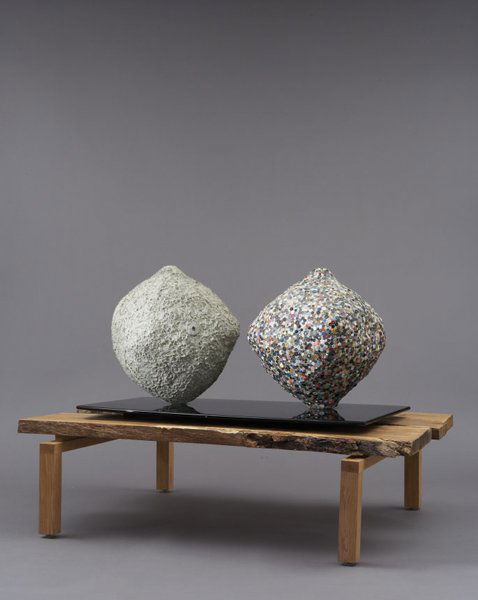 MIKE KELLEY b. 1954 Balance Mass and Emotional: MIKEKELLEYb. 1954Balance Mass and Emotional Investment, 2001Tile grout, plastic, buttons on oak table by Able McHone.<