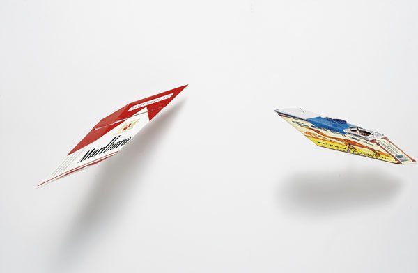 ROBERT LAZZARINI b. 1965 Cigarettes, 2004 Pap: ROBERTLAZZARINIb. 1965Cigarettes, 2004Paper, foil, tobacco with metal armature.6 x 18 x 8 in. (15.