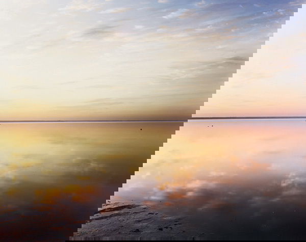 JOEL MEYEROWITZ b. 1938 Bay Sky, 1991 C-prin: JOELMEYEROWITZb. 1938Bay Sky, 1991C-print.10 ⅞ x 13 ⅞ in. (27.6 x 35.2 cm).