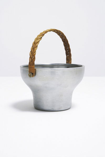 RUSSEL WRIGHT b. 1904-1976 Ice bucket, ca. 19: RUSSELWRIGHTb. 1904-1976Ice bucket, ca. 1933Spun aluminum, wicker. Manufactured by Wright Accessories, USA. From the Informa