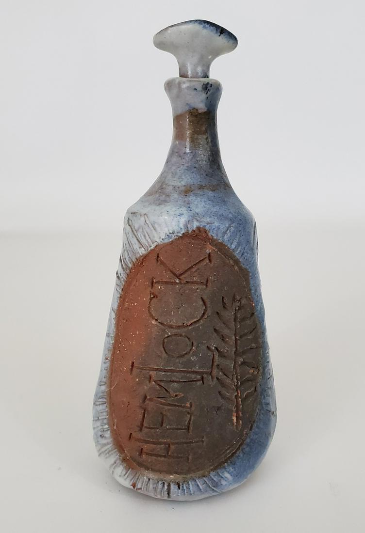 Laughlin-Bashor, Rosemary - stoneware, good condition,: "Hemlock" potion bottle by Rosemary Laughlin-Bashor (1922-2016) measures 7.5x3, is in good condition. Laughlin-Bashor was born Rosemary Chapee in Meade County, Kansas, in 1922, Rosemary Bashor later l
