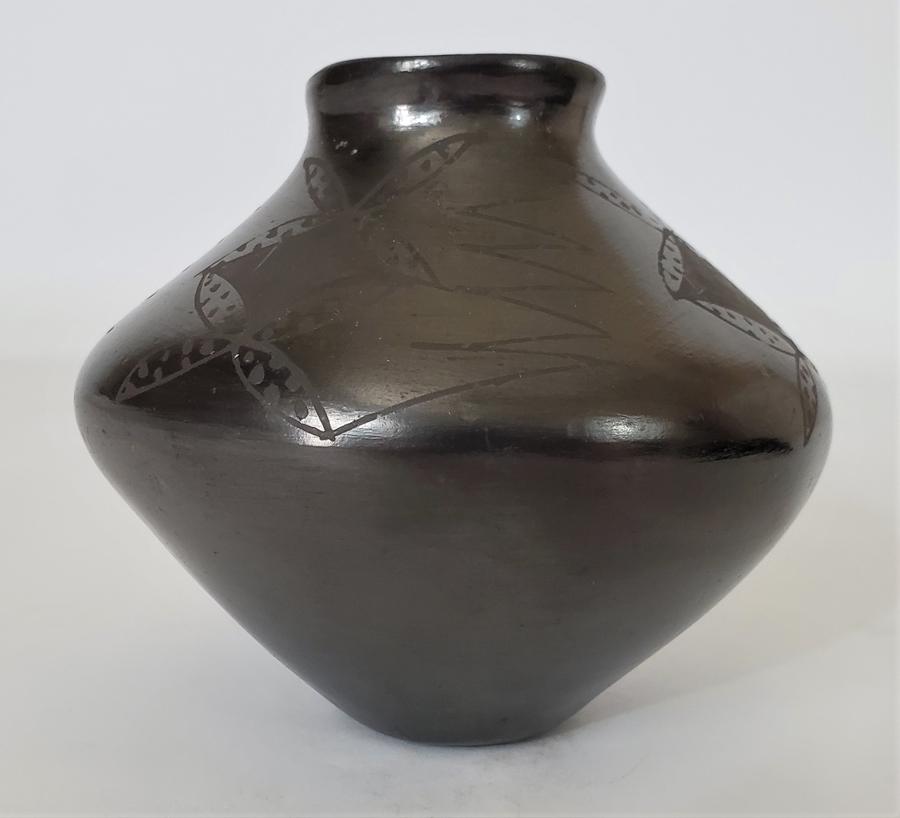 Lucero, Pablo - Pueblo pottery, good condition,: An untitled Pueblo pottery signed "Pablo Lucero" on the bottom. It is in good condition measuring 4.5x4.5.