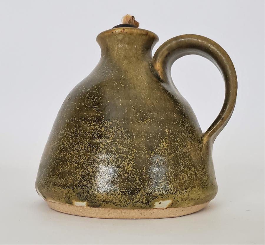 Taylor, Glenda - stoneware, good condition, 4.5" tall x: This is an original wheel thrown, stoneware oil lamp by Glenda Taylor (1954-2015) measures 4.5" tall x 4.5" diameter x 5" with the handle and is in good condition and signed "Taylor" on bottom. Taylor