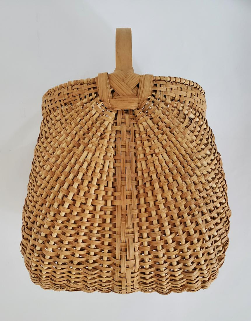 Kahler, Caroline - handwoven basket, good condition,: Handwoven basket by Caroline Kahler. Peosta, IA, is titled "Granny's Fanny" and is signed "Caroline Kahler" inside the basket handle. The basket is in good condition and measures 14x10x8 and is dated