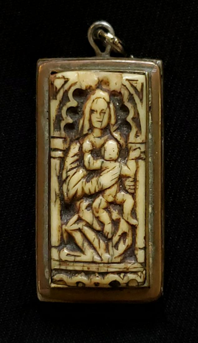 Madonna and Child pendant - Raymer, Lester: Raymer, Lester, metal and bone, signature: signed with "R" on back, good condition, Madonna and Child pendant, image dimensions:, total dimensions:1.25 x 1 x .25, weight:0lb