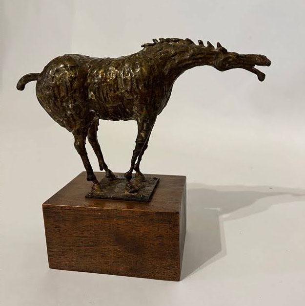 Raymer, Lester (1907-1991) metal sculpture, horse: Lester Raymer (1907-1991) metal sculpture, horse, signed in metal base "L RAYMER" and on bottom of wood base, good condition. The metal sculpture measures 5 x 8.5 x 2.25. Lester Raymer, born in 1907,