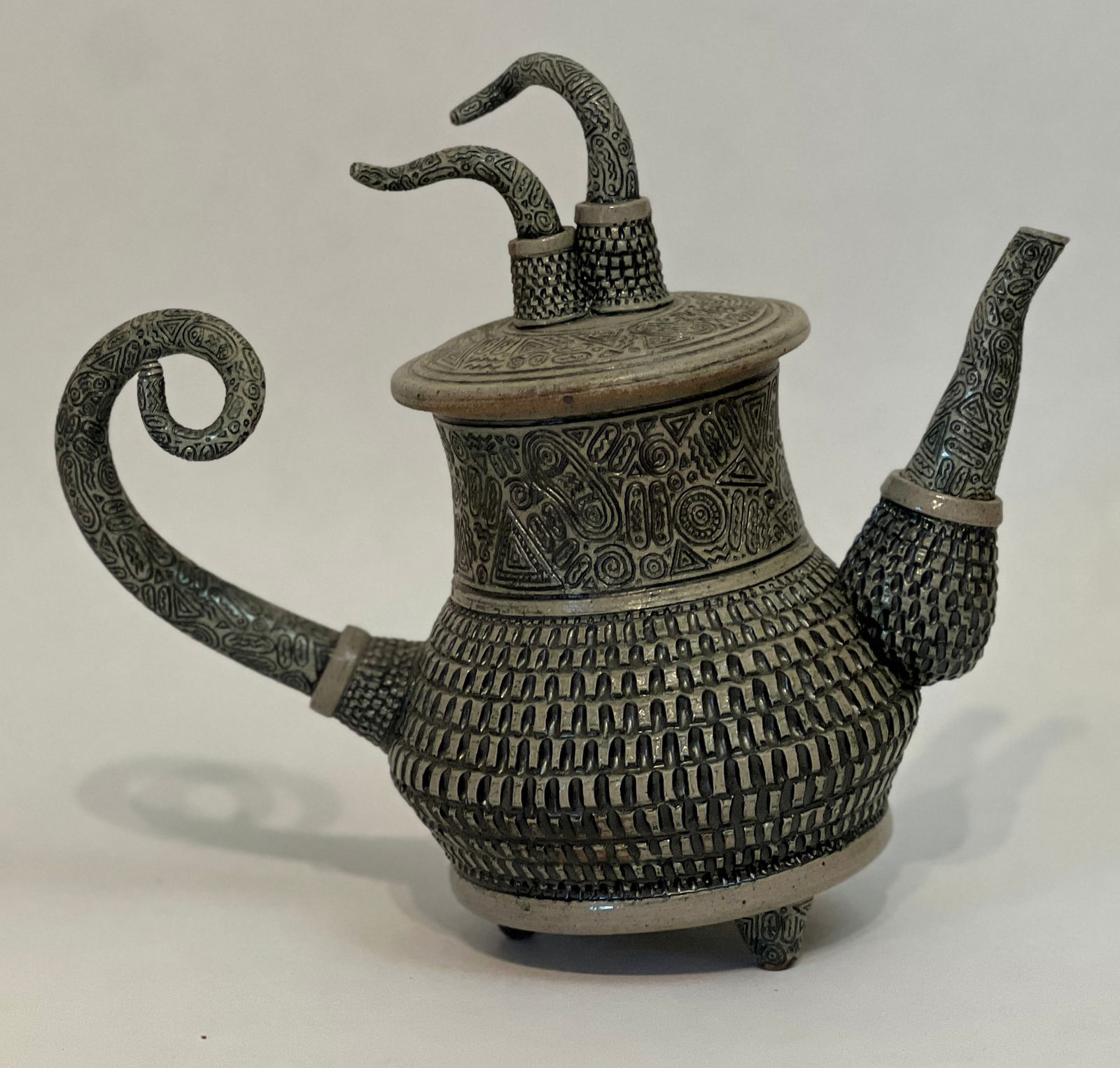 Fields, Marko, 2001 stoneware teapot: Marko Fields, 2001 stoneware teapot, signed on bottom, good conditon, no chips or cracks, size: 9.75 x 11 x 5 inches, Marko Fields' ceramic and mixed media work reflects a mid-life career change; in h