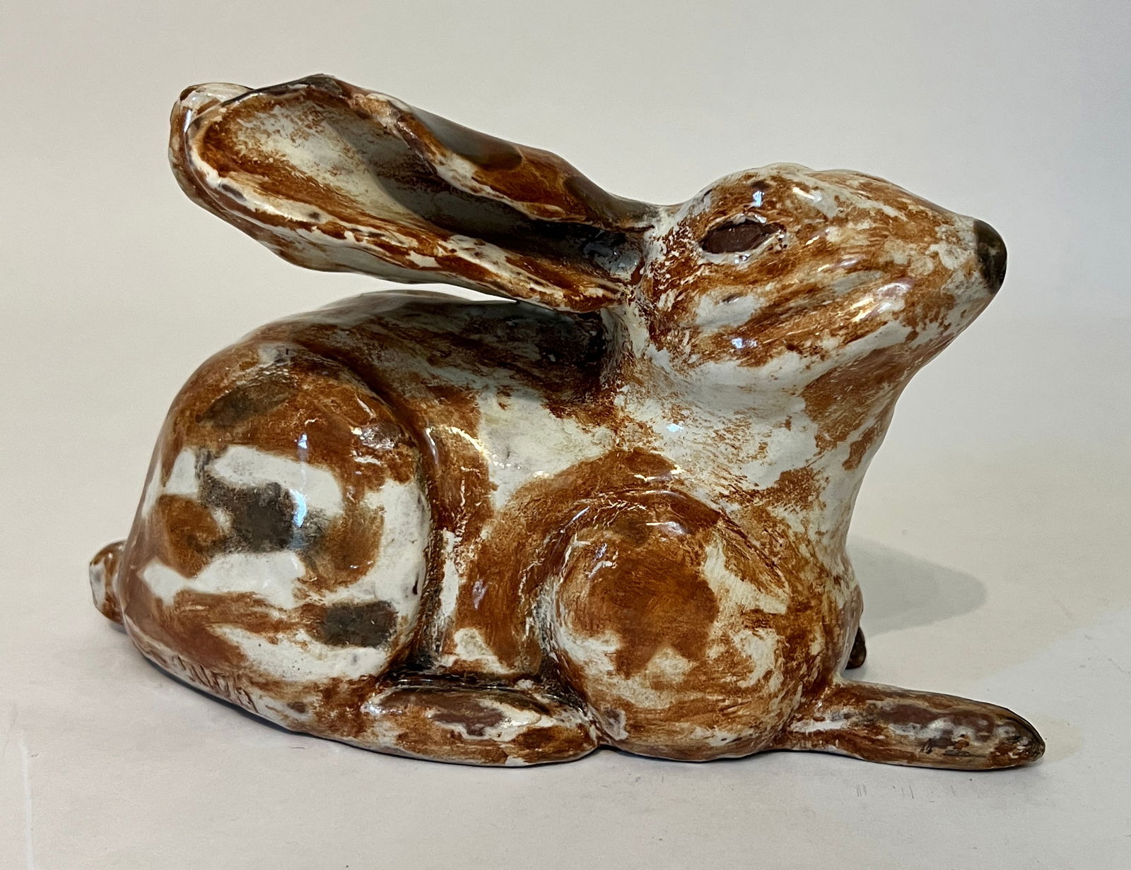 Ebaugh, Max (1918-2013) rabbit, ceramic: Max Ebaugh (1918-2013) ceramic rabbit, signed on rabbit's right hip, good condition, no chips or cracks, 5" x 8.5" x 4". Max was born on December 4, 1918, in rural McPherson County, KS. He graduated f