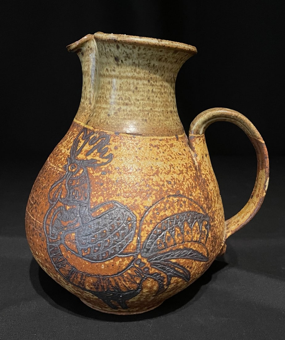 Garzio, Angelo (1922-2008) stoneware, rooster pitcher: Garzio, Angelo (1922-2008) stoneware, rooster pitcher, signed on bottom, good condition, no chips or cracks, pitcher size: 9 x 7 x 8 inches. Angelo Garzio (1922-2008) was born in Italy and immigrated