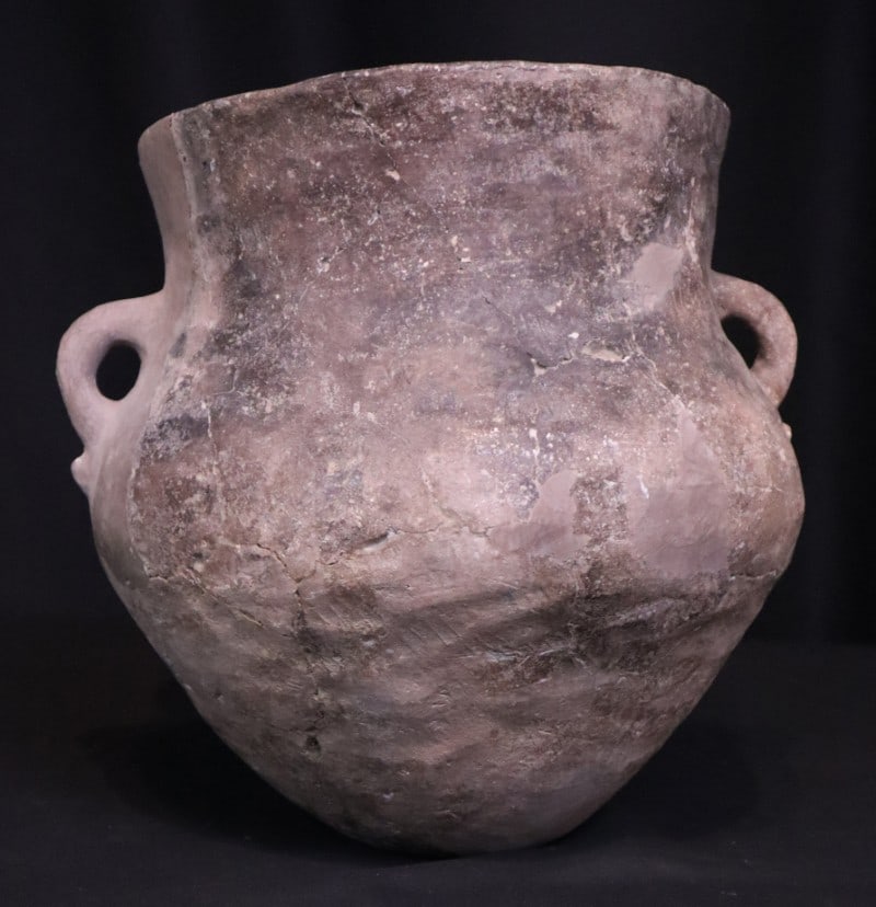 Native American utilitarian clay pot: Native American utilitarian clay pot, unsigned, repaired sherds of Native American pottery, repaired pot size: 13 x 12.5 x 12 inches. Consignor's father, Charles O. Smith, Jr., found the broken pieces
