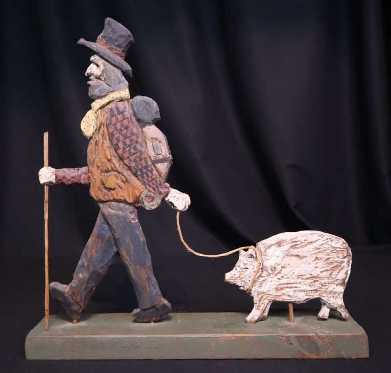 Sherwood, Brandon, 1984 woodcarving/polychrome, walking a pig (1 of 7)