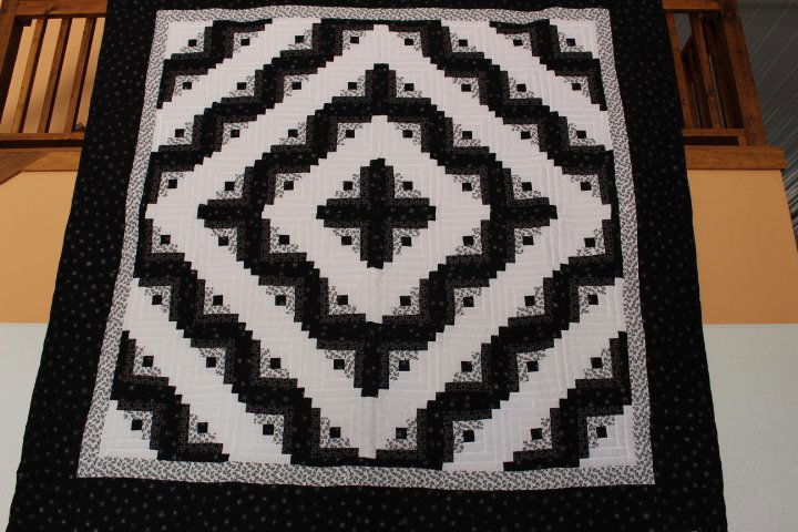 Log Cabi Quilt Black and White 105" X 105" Log Cabi: Log Cabi Quilt Black and White 105" X 105" Darker Spots on photos are shadows. Please look at photos Color may vary due to camera settings. Please call for more
