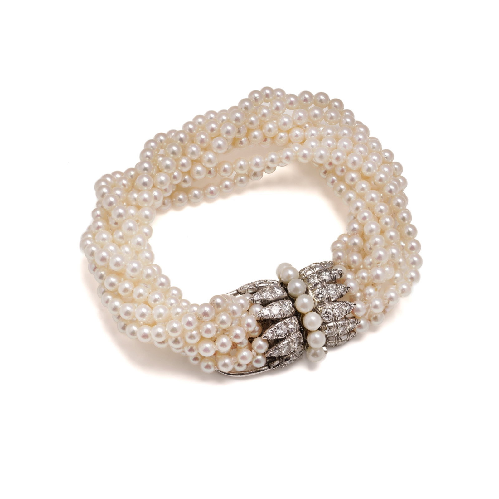 Van Cleef & Arpels Multi -Strand Cultured Pearl & Diamond Bow Bracelet in Platinum: A stunning mid-20th-century bracelet by Van Cleef & Arpels, showcasing nine rows of lustrous, near-round cultured pearls, each measuring approximately 4 mm in diameter. The bracelet is secured with an