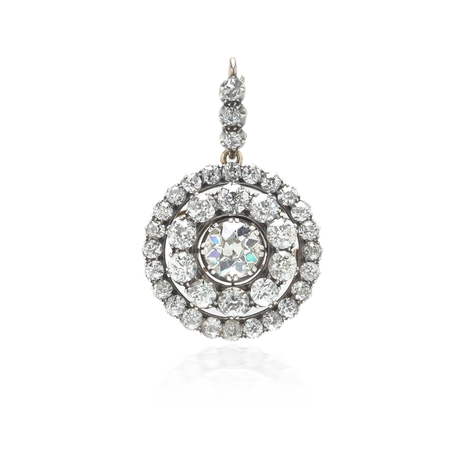 Victorian Diamond Cluster Pendant Brooch, Approx. 6.76 ct, Silver Topped 9KT Gold: A Victorian diamond cluster brooch that converts to a pendant, built as a double halo target around a single old cut diamond of approximately 1.70 ct. Roughly 6.76 ct of old cut diamonds in total. The