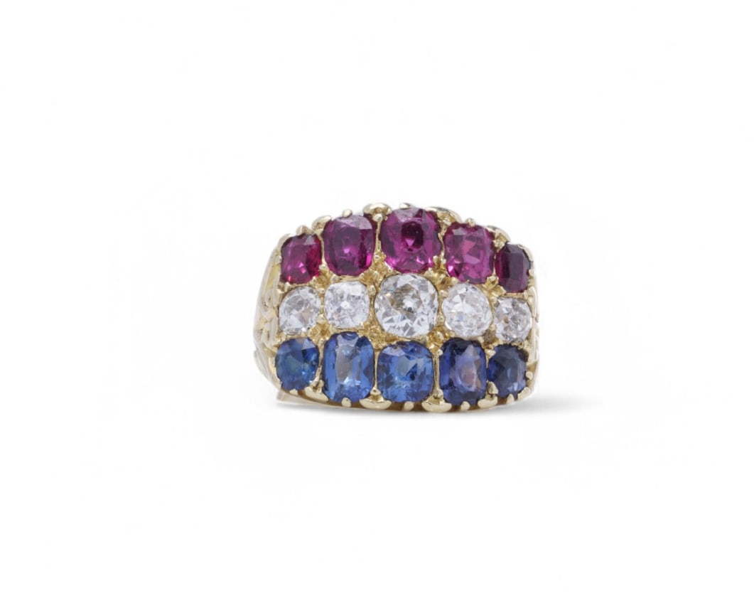 18KT gold Ruby, Diamond and Blue Sapphire Ring: 18kt gold Ruby, Diamond and Blue Sapphire Ring. A beautifully crafted 18kt yellow gold ring, set with an elegant combination of five oval mixed-cut natural rubies, five oval mixed-cut natural sapphire