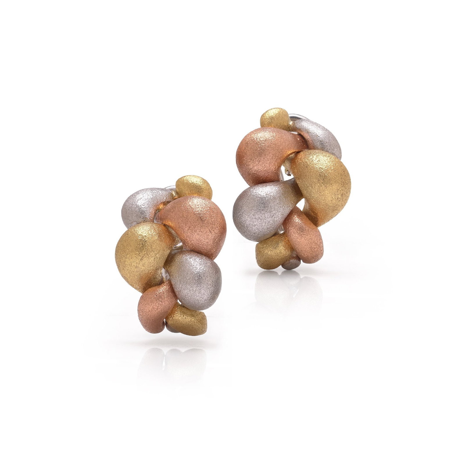 Craig Drake 18KT Tri-Colour Gold Pebble Clip Earrings: A pair of Craig Drake earrings in 18KT tri-colour gold, designed as brushed organic pebble clusters in yellow, rose and white gold. The sculptural surface gives the earrings a soft modernist feel whil