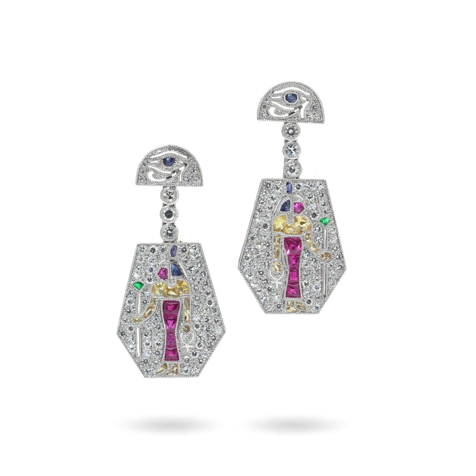 Art Deco Style Platinum Gem-Set Eye of Horus Earrings: A striking pair of modern platinum earrings in the Art Deco taste, designed with strong Egyptian Revival influence. Each earring is surmounted by an Eye of Horus motif, suspended from a vertical line 