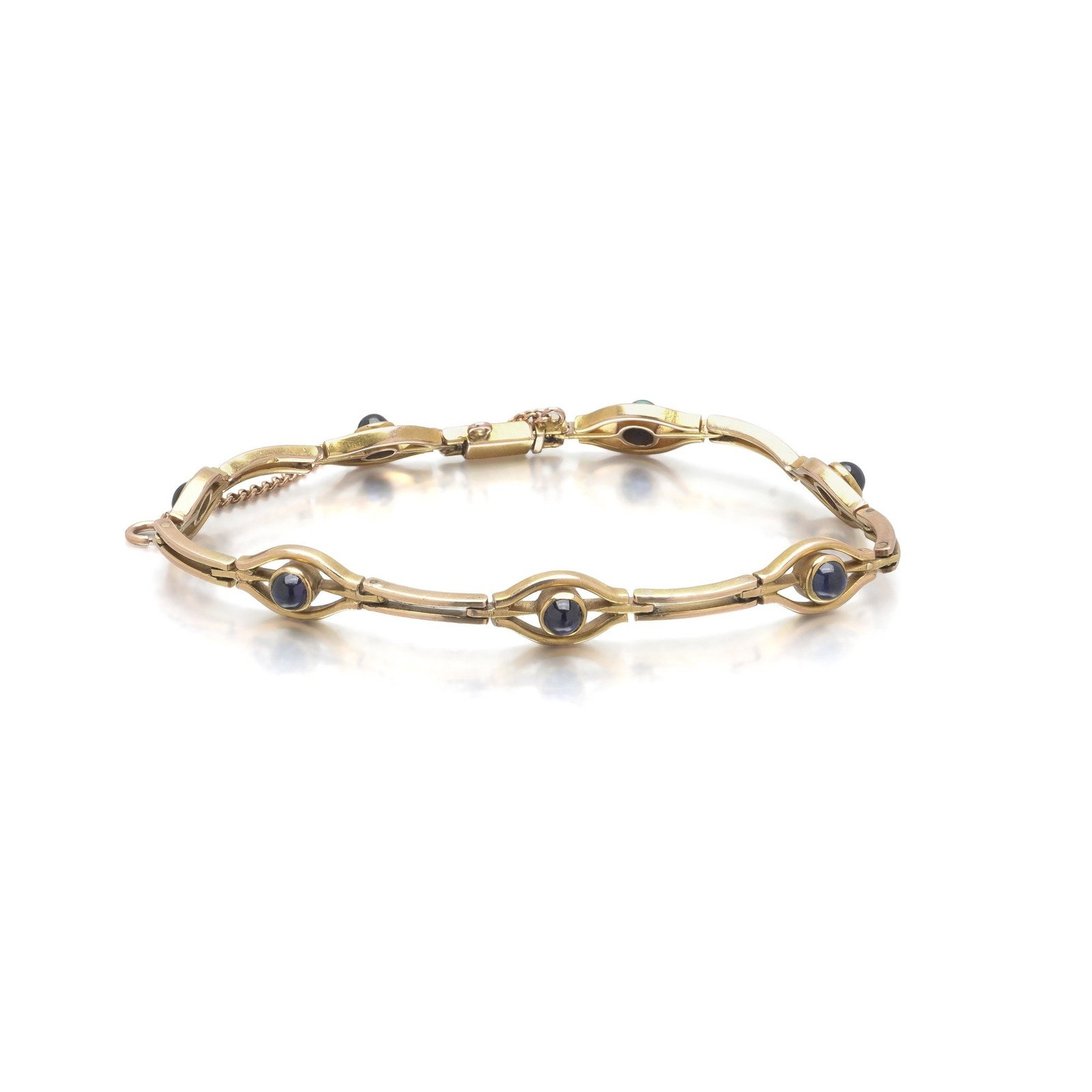 Imperial Russian 14KT Gold and Sapphire Bracelet, Kokoshnik Hallmark: Imperial Russian 14KT gold bracelet set with cabochon sapphires in navette shaped links, struck with the kokoshnik assay mark and the 56 zolotnik standard. The kokoshnik, the head of a woman in the tr