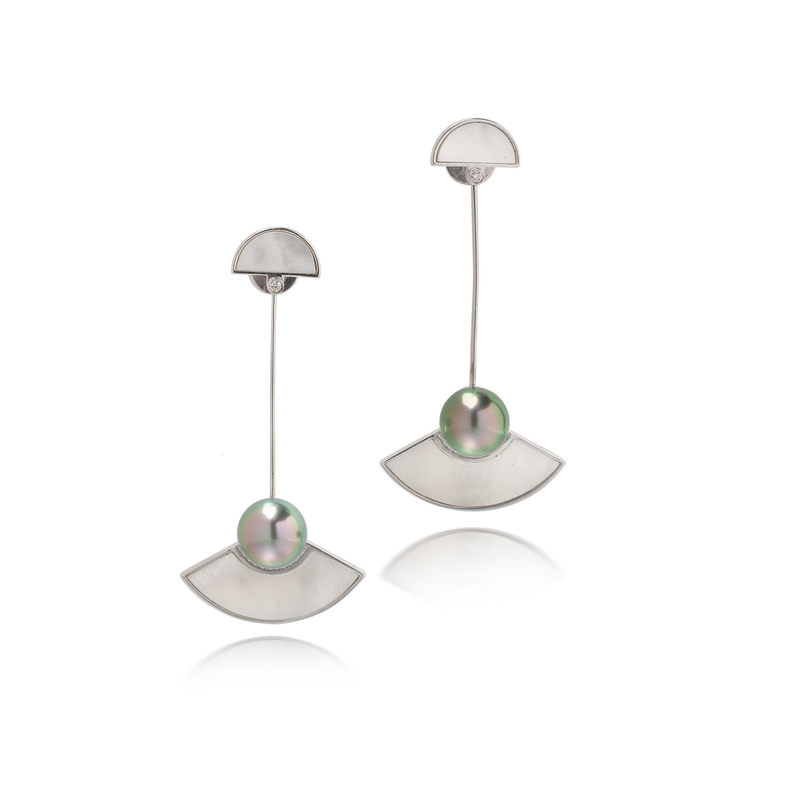 Robert Wan 18KT White Gold Tahitian Pearl, Diamond and Mother-of-Pearl Drop Earrings: A signed pair of Robert Wan drop earrings in 18KT white gold, with geometric fan shaped mother of pearl panels connected by slender articulated bars to dark Tahitian cultured pearls. Diamond set curve