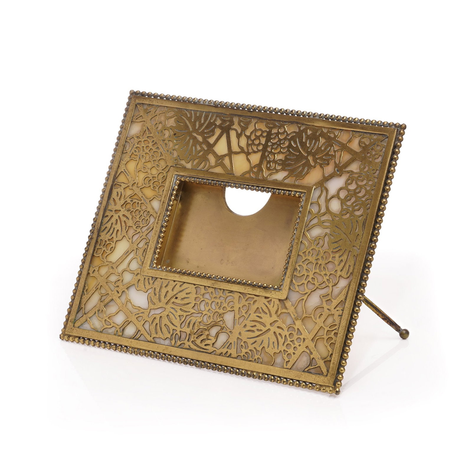 Tiffany Studios Art Nouveau Bronze "Slag Glass" Table Calendar: An exceptional Tiffany Studios Art Nouveau bronze table calendar, crafted in New York circa 1910. Featuring intricate floral motifs, beaded edging, and original slag glass inserts, this piece exemplif