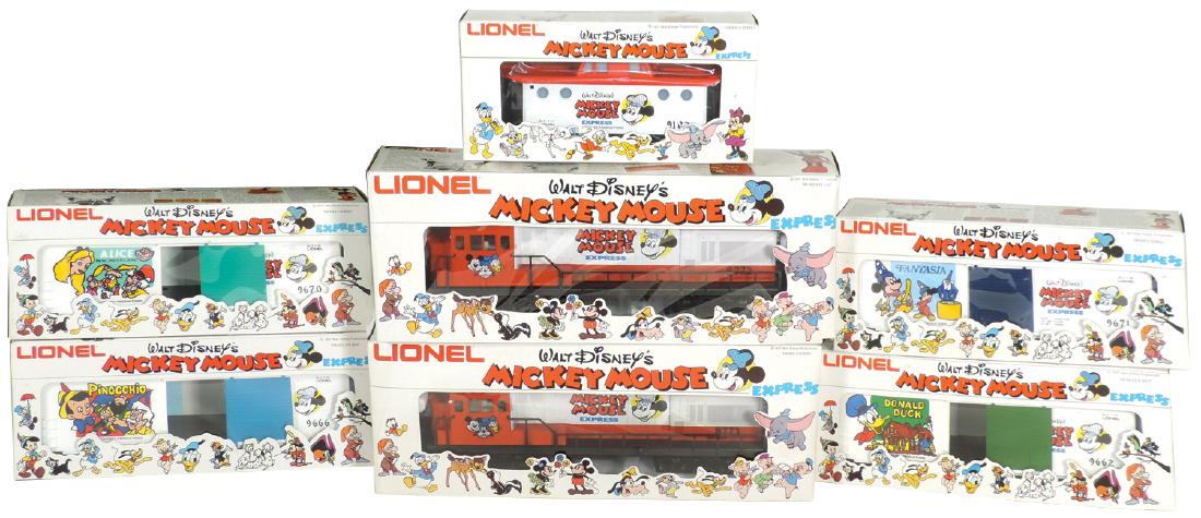 Toy train cars/engines w/boxes (7), Lionel Mickey Mouse: Toy train cars/engines w/boxes (7), Lionel Mickey Mouse Express diesel engines (2), box cars (4) incl Donald Duck, Fantasia, Pinocchio & Alice in Wonderland, caboose, plastic, c.1970's, Near-Mint, box