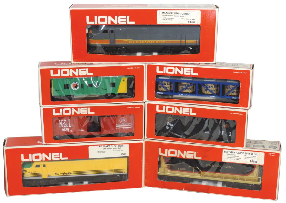 Toy train cars/engines w/boxes (7), Lionel Rio Grande,: Toy train cars/engines w/boxes (7), Lionel Rio Grande, Milwaukee Road, Northern Pacific Diesels (3), box cars (2), wine car & bay window caboose, all Near-Mint cond, boxes VG, 10"-13"L.