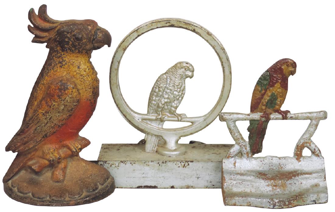 Doorstops (3), all cast iron parrots, 2 w/orig paint,: Doorstops (3), all cast iron parrots, 2 w/orig paint, all VG cond, up to 9"H.