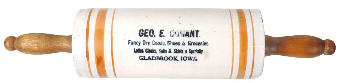 Stoneware rolling pin w/adv from Geo. E. Conant,: Stoneware rolling pin w/adv from Geo. E. Conant, Gladbrook, IA, couple shallow side nicks, o/wise Exc cond, 14.5"L.