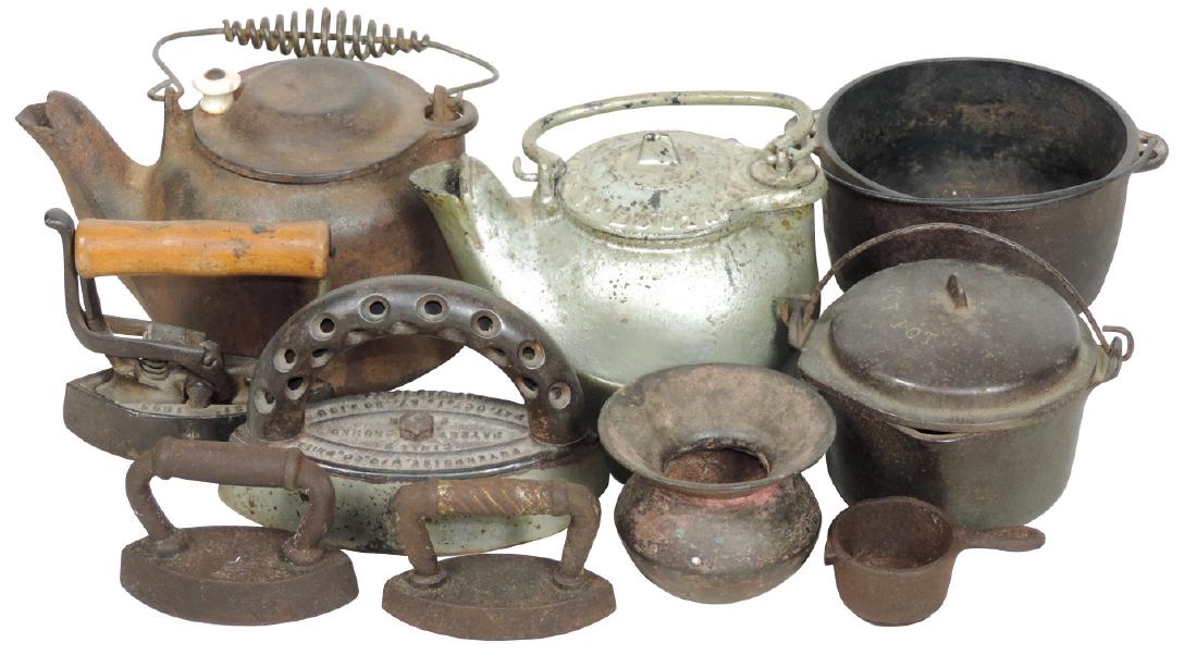 Children's cast iron cookware (10), tea kettles,: Children's cast iron cookware (10), tea kettles, caldron, Wagner Ware Hot Pot, spittoon, 4 sadirons (1 marked Enterprise Mfg Co.), all VG/Exc cond, largest 4"H.