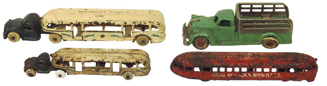 Toy bus/trams, stake truck & train (4), Hubley stake: Toy bus/trams, stake truck & train (4), Hubley stake truck 2238B, some paint loss, VG+ cond, 2 Arcade Chicago World's Fair GMC Greyhound Lines bus/tram, c.1933, overall paint loss on both, one Good &