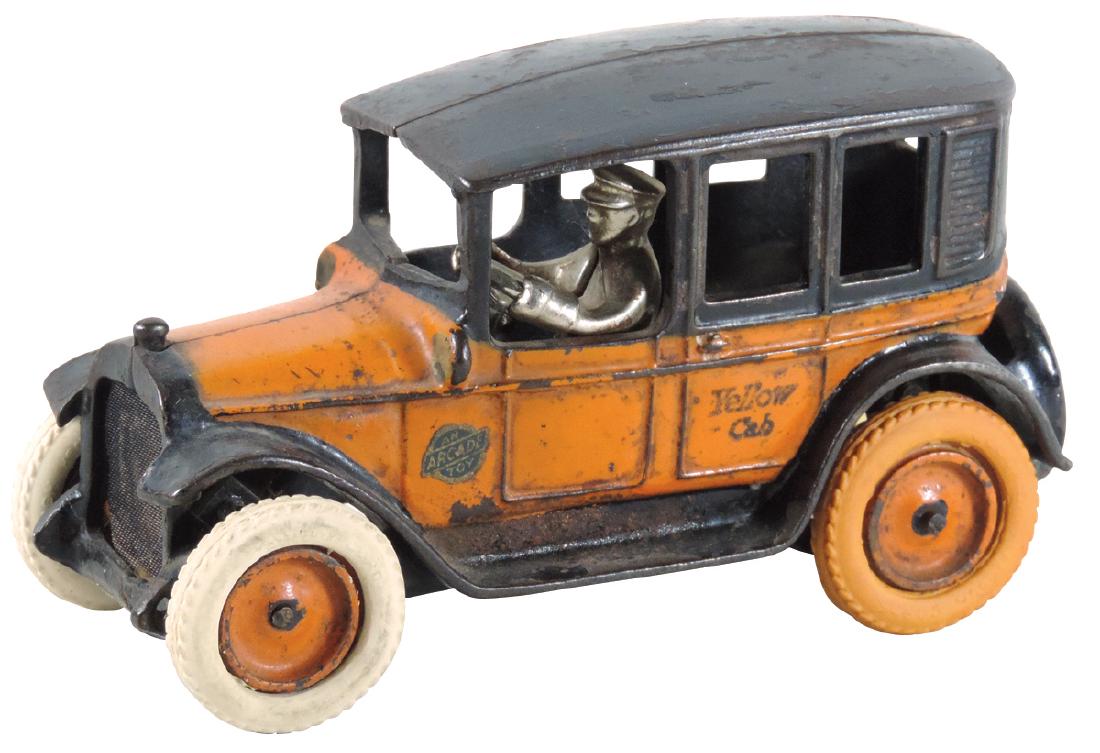 Toy car, Arcade taxi w/driver, cast iron w/black &: Toy car, Arcade taxi w/driver, cast iron w/black & orange paint & orig Arcade decal, rubber tires & wire grille that's often missing, c.1930's, VG+ cond, 8"L.