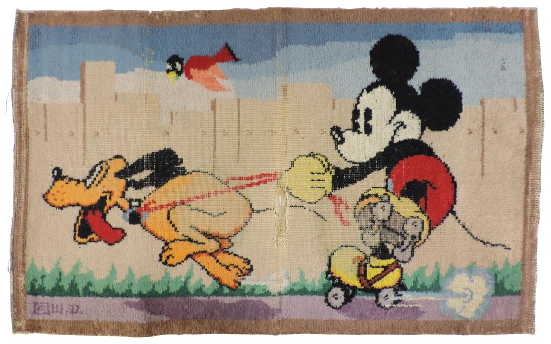 Children's Walt Disney character rug, Mickey Mouse &: Children's Walt Disney character rug, Mickey Mouse & Pluto, marked W.D., Mickey on roller skates pulled by Pluto, Fair/Good cond w/heavy wear & split in center, 26.5"H x 43"W.