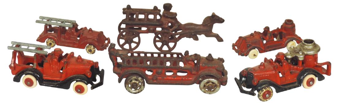 Toy fire trucks (6), 3 ladder trucks, 2 tanker trucks &: Toy fire trucks (6), 3 ladder trucks, 2 tanker trucks & horse-drawn ladder wagon, all cast iron, some orig paint & some repaint, Good/VG cond, up to 5.5"L.