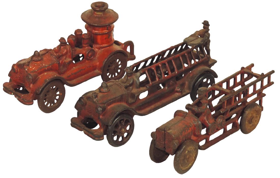 Toy fire trucks (3), Hubley ladder truck & tanker plus: Toy fire trucks (3), Hubley ladder truck & tanker plus another Hubley or Arcade ladder truck, all cast iron w/orig aged paint, VG/VG+ cond, up to 7.5"L.
