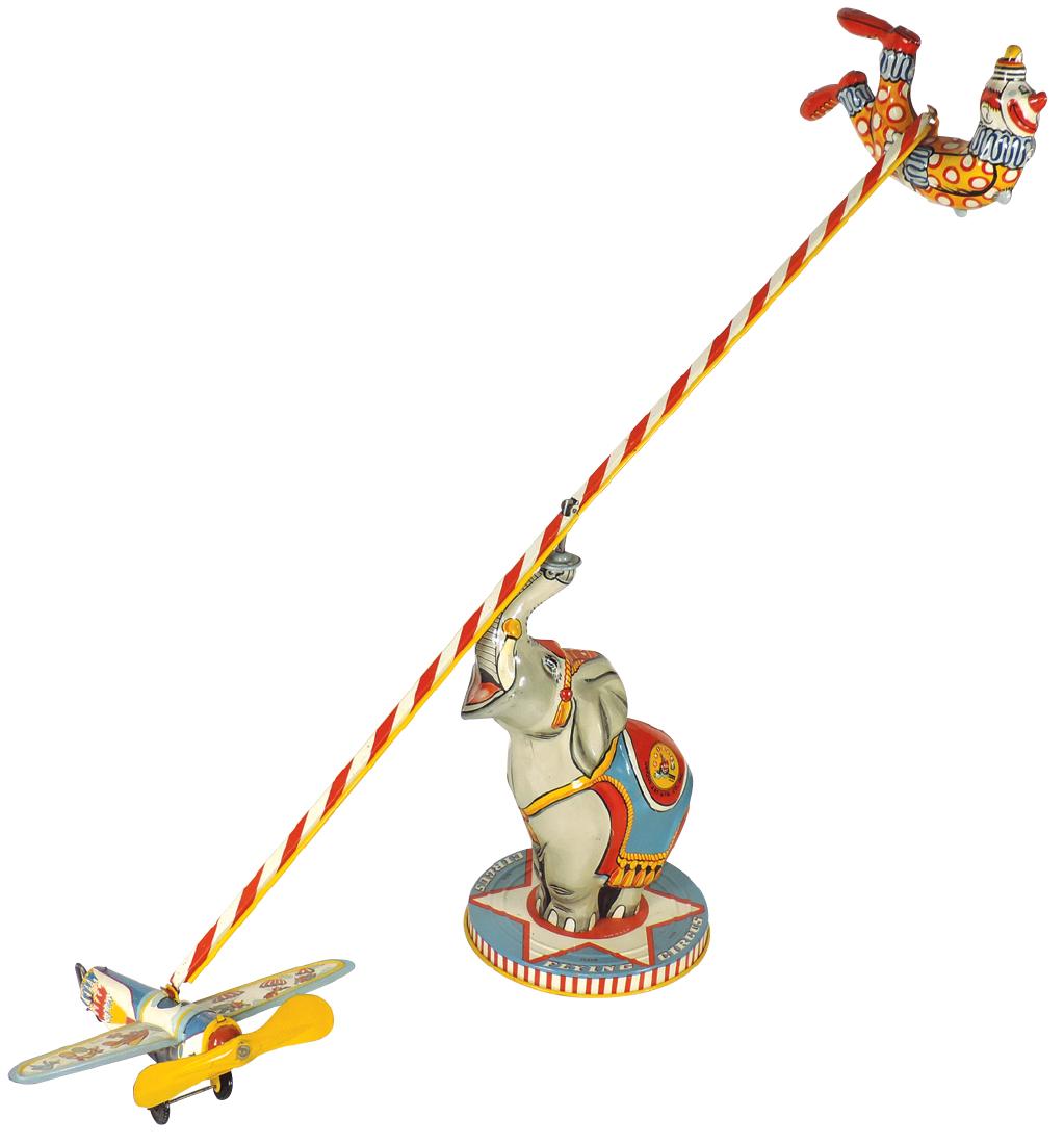 Toy, Flying Circus, mfgd by Unique Art, litho on tin: Toy, Flying Circus, mfgd by Unique Art, litho on tin windup, Exc+ to Near-Mint cond w/Good+/VG box, 12"H x 40"W assembled.